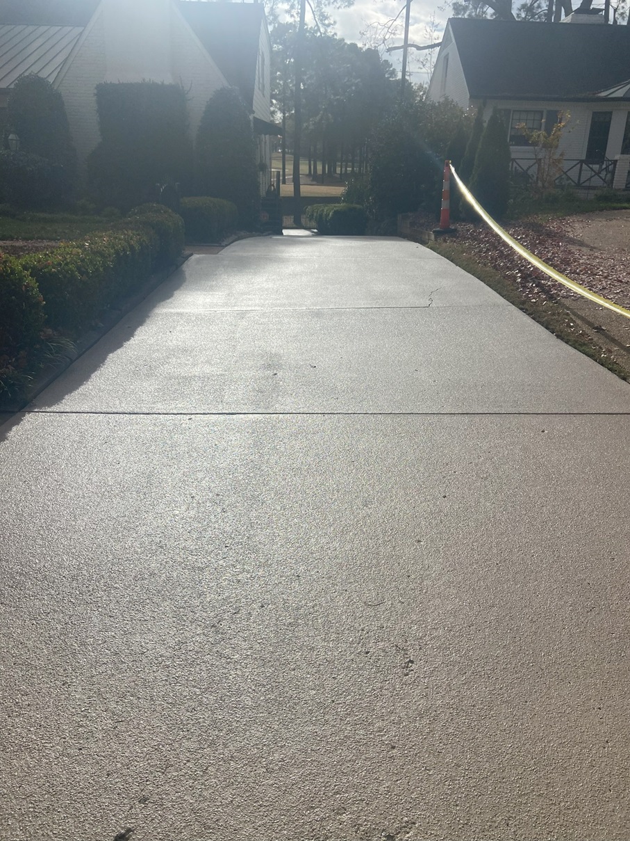 https://advanced-surface.com/wp-content/uploads/2024/09/pigmented-sealer-on-driveway-2.jpg